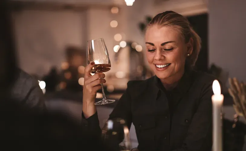 woman-drinking-wine-at-night